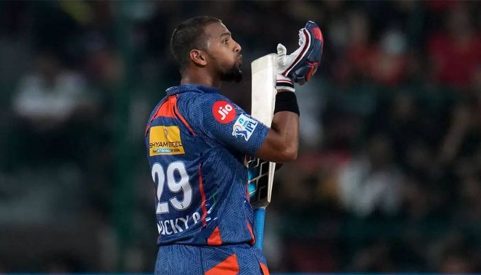 Nicholas pooran height in Feet