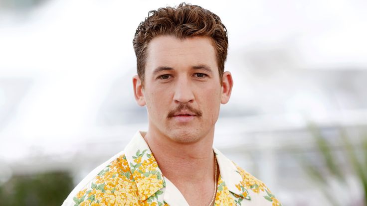 Miles teller height in feet